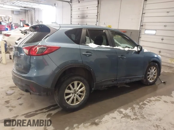✅ 2015 Mazda CX-5 Touring • VIN: JM3KE4CY5F0547994 • Lot: 44223897. Wystawiony na IAAI z przebiegiem 135 000 mil. Bezpłatny archiwum sprzedaży aukcyjnych z USA i szczegółowy raport historii pojazdu na DreamBid. Zdjęcie 4.