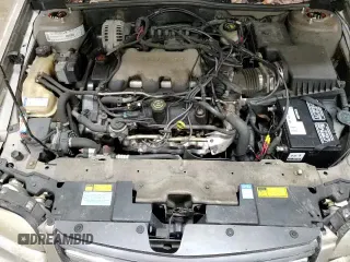 2000 Chevrolet Malibu z VIN 1G1ND52J1Y6275875, wystawiony jako Copart lot #83699264 z przebiegiem 128 288 mil mil oraz Szkoda całkowita • Salvage title. Historia ofert i sprzedaży dostępna na DreamBid. Obrazek 13.