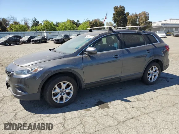 ✅ 2015 Mazda CX-9 Touring • VIN: JM3TB3CA6F0453830 • Lot: 56558445. Wystawiony na Copart z przebiegiem 84 199 mil. Bezpłatny archiwum sprzedaży aukcyjnych z USA i szczegółowy raport historii pojazdu na DreamBid. Zdjęcie 1.