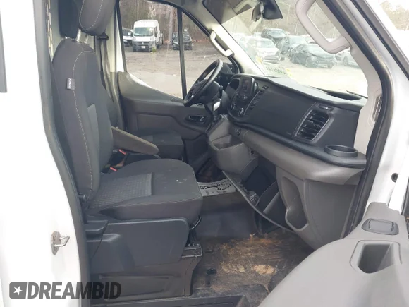 ✅ 2023 Ford Transit Cargo • VIN: 1FTBR1X83PKA12156 • Лот: 44006244. Опубліковано раніше на IAAI з пробігом 170 915 миль. Безкоштовний доступ до архіву аукціонних продажів зі США та докладний звіт про історію автомобіля на DreamBid. Зображення 5.
