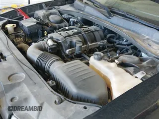 ✅ 2013 Dodge Charger Police • VIN: 2C3CDXATXDH673712 • Lot: 42487574. Listed on IAAI with 134,775 mi. Free auction sales archive from the USA and detailed vehicle history report at DreamBid. Image 12.