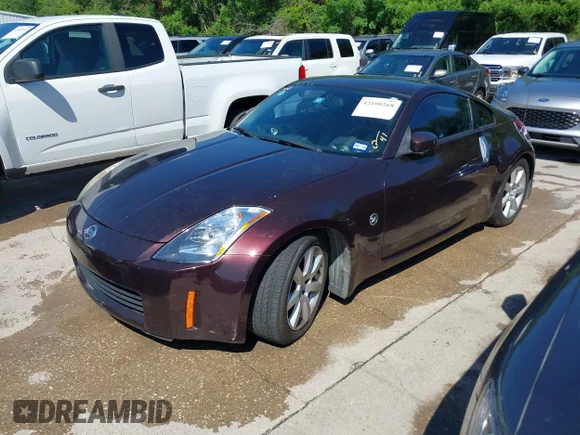 ✅ 2003 Nissan 350Z Enthusiast • VIN: JN1AZ34D53T118124 • Lot: 42108268. Wystawiony na IAAI z przebiegiem 226 959 mil. Bezpłatny archiwum sprzedaży aukcyjnych z USA i szczegółowy raport historii pojazdu na DreamBid. Zdjęcie 2.