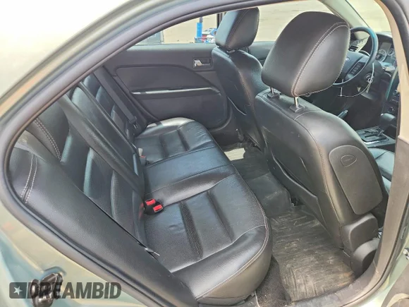 ✅ 2009 Ford Fusion SEL • VIN: 3FAHP08Z69R210963 • Lot: 56126006. Wystawiony na Copart z przebiegiem 174 583 mil. Bezpłatny archiwum sprzedaży aukcyjnych z USA i szczegółowy raport historii pojazdu na DreamBid. Zdjęcie 10.