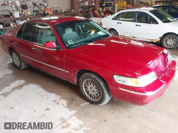 ✅ 2001 Mercury Grand Marquis GS • VIN: 2MEFM74W01X636957 • Lot: 42270858. Wystawiony na IAAI z przebiegiem 181 372 mil. Bezpłatny archiwum sprzedaży aukcyjnych z USA i szczegółowy raport historii pojazdu na DreamBid. Zdjęcie 1.