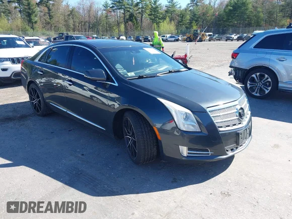 ✅ 2013 Cadillac XTS Platinum • VIN: 2G61V5S34D9131392 • Lot: 45058183. Listed on IAAI with 204,745 mi. Free auction sales archive from the USA and detailed vehicle history report at DreamBid. Image 1.