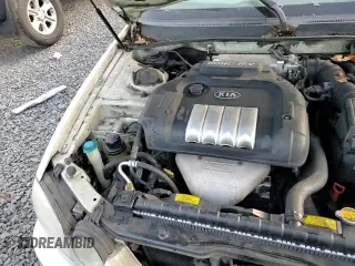 ✅ 2006 Kia Optima LX • VIN: KNAGD126065450444 • Лот: 83718164. Опубликован ранее на Copart с пробегом 127 876 миль. Бесплатный доступ к архиву аукционных продаж из США и подробный отчёт об истории автомобиля на DreamBid. Изображение 13.