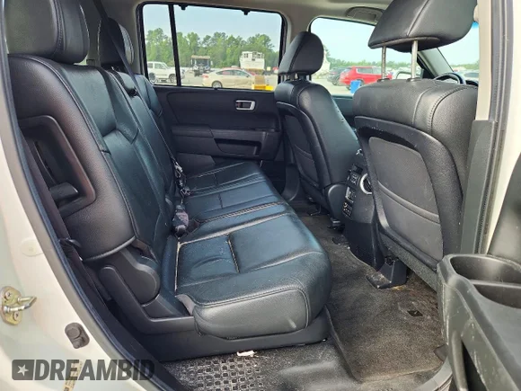 ✅ 2013 Honda Pilot Touring • VIN: 5FNYF4H92DB009169 • Лот: 55021936. Опубликован ранее на Copart с пробегом 259 728 миль. Бесплатный доступ к архиву аукционных продаж из США и подробный отчёт об истории автомобиля на DreamBid. Изображение 11.