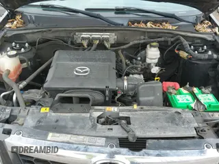 ✅ 2011 Mazda Tribute Grand Touring • VIN: 4F2CY9GG9BKM04841 • Lot: 41678924. Listed on IAAI with 180,424 mi. Free auction sales archive from the USA and detailed vehicle history report at DreamBid. Image 13.