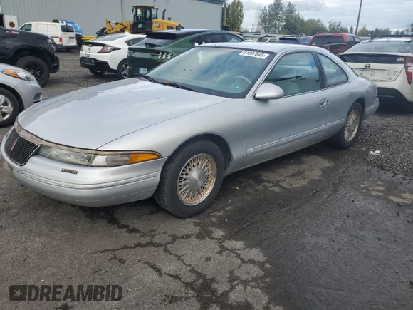 ✅ 1995 Lincoln Mark VIII • VIN: 1LNLM91V1SY661567 • Lot: 81997845. Wystawiony na Copart z przebiegiem 119 303 mil. Bezpłatny archiwum sprzedaży aukcyjnych z USA i szczegółowy raport historii pojazdu na DreamBid. Zdjęcie 1.