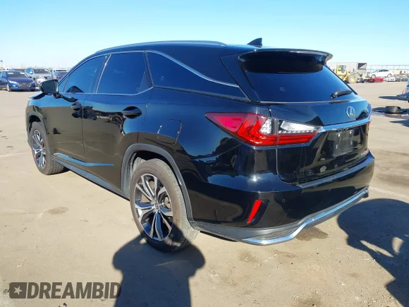 ✅ 2018 Lexus RX 350L Premium • VIN: JTJDZKCA6J2011630 • Лот: 44187512. Опубликован ранее на IAAI с пробегом 73 840 миль. Бесплатный доступ к архиву аукционных продаж из США и подробный отчёт об истории автомобиля на DreamBid. Изображение 3.