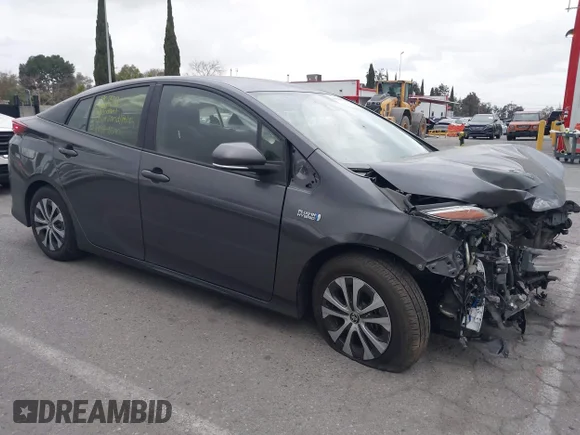 ✅ 2022 Toyota Prius XLE • VIN: JTDKAMFP1N3229164 • Lot: 44364116. Listed on IAAI with 39,121 mi. Free auction sales archive from the USA and detailed vehicle history report at DreamBid. Image 1.