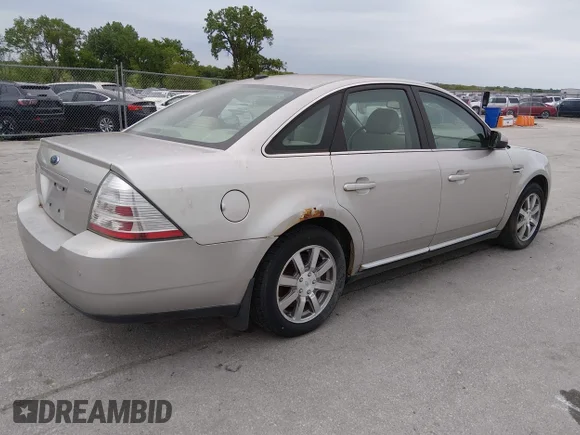 ✅ 2008 Ford Taurus SEL • VIN: 1FAHP24W18G184527 • Lot: 45199950. Listed on IAAI with 161,701 mi. Free auction sales archive from the USA and detailed vehicle history report at DreamBid. Image 4.