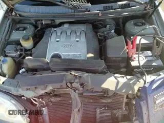 ✅ 2005 Kia Sedona LX • VIN: KNDUP132656738101 • Lot: 87332664. Listed on Copart with 152,315 mi. Free auction sales archive from the USA and detailed vehicle history report at DreamBid. Image 14.