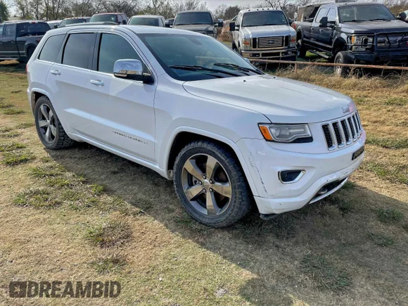 ✅ 2015 Jeep Grand Cherokee Overland • VIN: 1C4RJFCM0FC618612 • Лот: 94445055. Опубликован ранее на Copart с пробегом 121 918 миль. Бесплатный доступ к архиву аукционных продаж из США и подробный отчёт об истории автомобиля на DreamBid. Изображение 1.