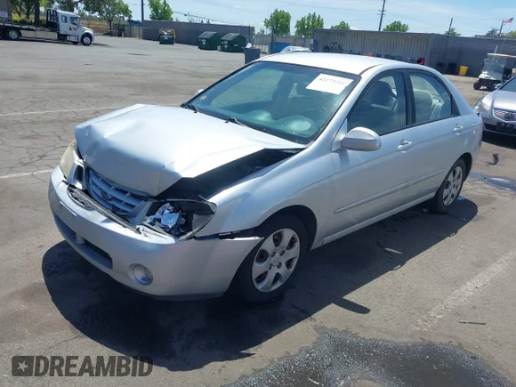 ✅ 2006 Kia Spectra EX • VIN: KNAFE122365290517 • Лот: 42273211. Опубліковано раніше на IAAI з пробігом 188 115 миль. Безкоштовний доступ до архіву аукціонних продажів зі США та докладний звіт про історію автомобіля на DreamBid. Зображення 2.