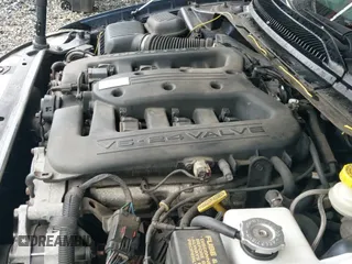 ✅ 2002 Chrysler 300M M • VIN: 2C3AE76K52H311224 • Lot: 42219634. Listed on IAAI with 172,884 mi. Free auction sales archive from the USA and detailed vehicle history report at DreamBid. Image 19.