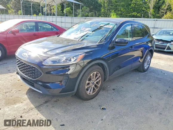 ✅ 2021 Ford Escape SE • VIN: 1FMCU0G62MUA98437 • Lot: 53516366. Listed on Copart with 53,231 mi. Free auction sales archive from the USA and detailed vehicle history report at DreamBid. Image 1.