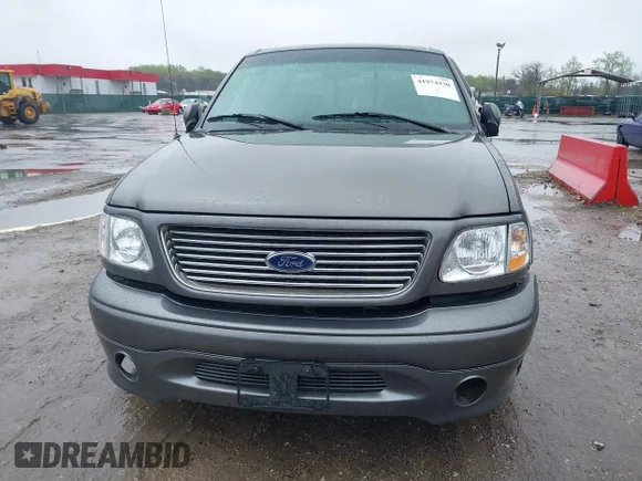 ✅ 2002 Ford F-150 Harley Davidson • VIN: 1FTRW07392KD29874 • Лот: 41974230. Опубліковано раніше на IAAI з пробігом 163 279 миль. Безкоштовний доступ до архіву аукціонних продажів зі США та докладний звіт про історію автомобіля на DreamBid. Зображення 6.