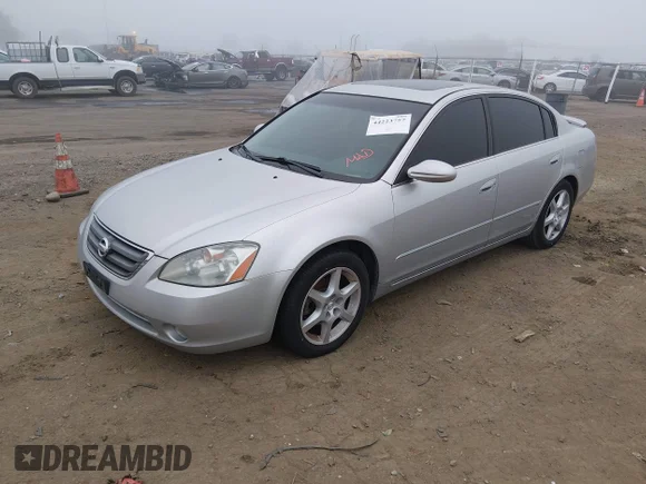 ✅ 2002 Nissan Altima SE • VIN: 1N4BL11E42C132122 • Lot: 44223757. Wystawiony na IAAI z przebiegiem 116 621 mil. Bezpłatny archiwum sprzedaży aukcyjnych z USA i szczegółowy raport historii pojazdu na DreamBid. Zdjęcie 2.