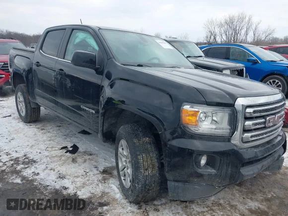 ✅ 2019 GMC Canyon 4WD SLE • VIN: 1GTG6CEN1K1313543 • Лот: 44200383. Опубликован ранее на IAAI с пробегом 71 853 миль. Бесплатный доступ к архиву аукционных продаж из США и подробный отчёт об истории автомобиля на DreamBid. Изображение 1.