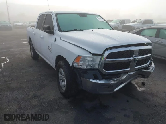 ✅ 2021 Ram 1500 SLT • VIN: 1C6RR6LG0MS533721 • Lot: 44338500. Listed on IAAI with 82,361 mi. Free auction sales archive from the USA and detailed vehicle history report at DreamBid. Image 1.