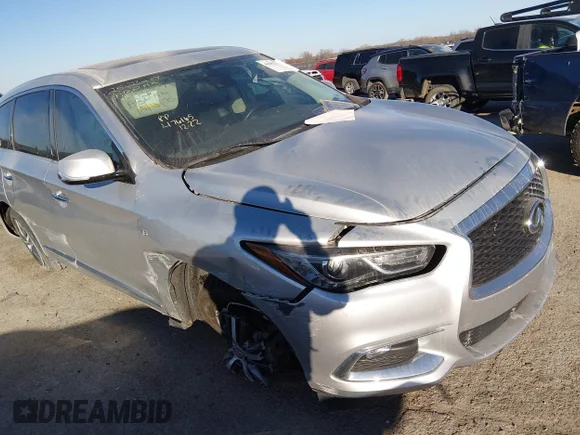 ✅ 2020 Infiniti QX60 Luxe • VIN: 5N1DL0MM9LC520203 • Lot: 44062273. Listed on IAAI with 107,505 mi. Free auction sales archive from the USA and detailed vehicle history report at DreamBid. Image 1.