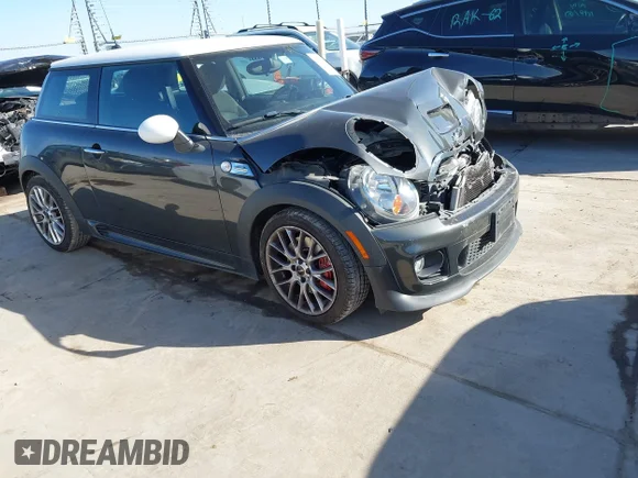 ✅ 2013 MINI Hardtop John Cooper Works • VIN: WMWSU9C57DT722043 • Lot: 43971691. Listed on IAAI with 63,741 mi. Free auction sales archive from the USA and detailed vehicle history report at DreamBid. Image 1.