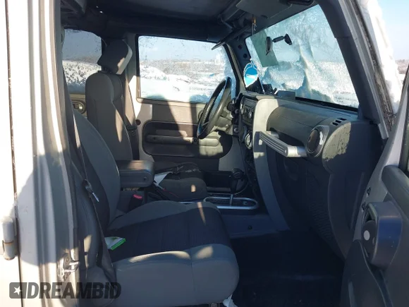 ✅ 2007 Jeep Wrangler Unlimited X • VIN: 1J8GA39157L177251 • Lot: 44190671. Listed on IAAI with 230,507 mi. Free auction sales archive from the USA and detailed vehicle history report at DreamBid. Image 5.