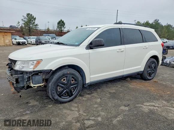 ✅ 2015 Dodge Journey SE • VIN: 3C4PDCAB2FT517610 • Лот: 76210595. Опубликован ранее на Copart с пробегом 130 181 миль. Бесплатный доступ к архиву аукционных продаж из США и подробный отчёт об истории автомобиля на DreamBid. Изображение 1.