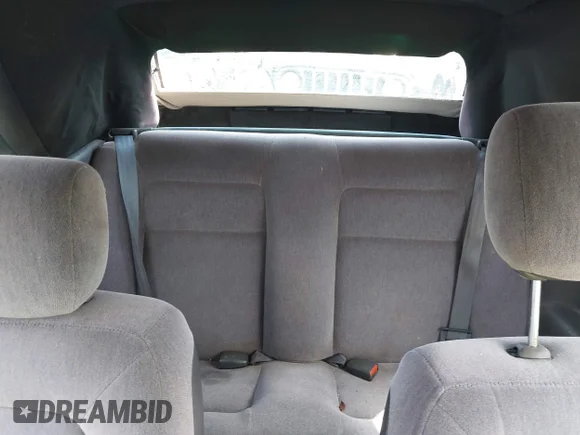 ✅ 1998 Chrysler Sebring JX • VIN: 3C3EL45H1WT262354 • Lot: 45261781. Listed on IAAI with 116,616 mi. Free auction sales archive from the USA and detailed vehicle history report at DreamBid. Image 8.