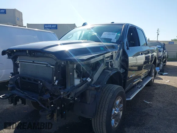 ✅ 2024 Ram 2500 Big Horn • VIN: 3C6UR5DJ7RG397603 • Лот: 45305754. Опубликован ранее на IAAI с пробегом 29 173 миль. Бесплатный доступ к архиву аукционных продаж из США и подробный отчёт об истории автомобиля на DreamBid. Изображение 2.