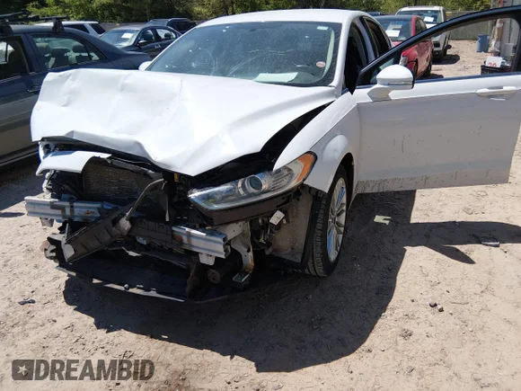 ✅ 2014 Ford Fusion SE • VIN: 3FA6P0H97ER338372 • Lot: 45132703. Listed on IAAI with 141,497 mi. Free auction sales archive from the USA and detailed vehicle history report at DreamBid. Image 6.