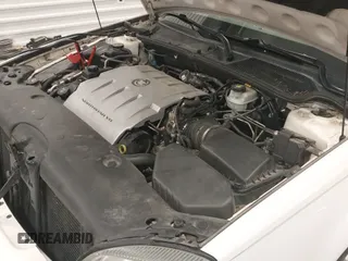 ✅ 2005 Cadillac DeVille • VIN: 1G6KD54Y25U109816 • Lot: 43530665. Listed on IAAI with 123,511 mi. Free auction sales archive from the USA and detailed vehicle history report at DreamBid. Image 12.