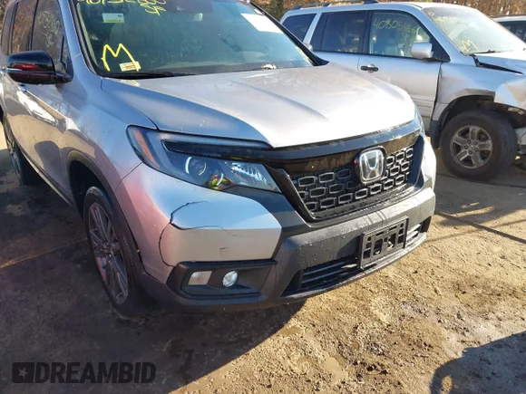 ✅ 2021 Honda Passport EX-L • VIN: 5FNYF8H54MB042677 • Lot: 40732860. Wystawiony na IAAI z przebiegiem 63 698 mil. Bezpłatny archiwum sprzedaży aukcyjnych z USA i szczegółowy raport historii pojazdu na DreamBid. Zdjęcie 6.
