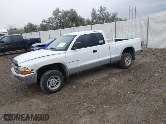 ✅ 1998 Dodge Dakota SLT • VIN: 1B7GG22Y0WS579450 • Лот: 43088532. Опубліковано раніше на IAAI з пробігом 279 555 миль. Безкоштовний доступ до архіву аукціонних продажів зі США та докладний звіт про історію автомобіля на DreamBid. Зображення 2.