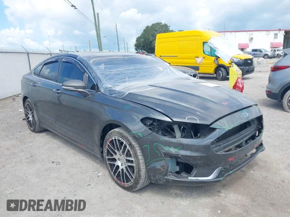 ✅ 2019 Ford Fusion Titanium • VIN: 3FA6P0D99KR143343 • Lot: 45114253. Listed on IAAI with 138,740 mi. Free auction sales archive from the USA and detailed vehicle history report at DreamBid. Image 1.