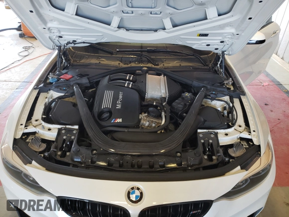 ✅ 2018 BMW M4 • VIN: WBS4Y9C52JAC87077 • Лот: 44323394. Опубликован ранее на Copart с пробегом 18 253 миль. Бесплатный доступ к архиву аукционных продаж из США и подробный отчёт об истории автомобиля на DreamBid. Изображение 7.