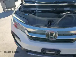 ✅ 2019 Honda Pilot Touring 7-Passenger • VIN: 5FNYF5H66KB033113 • Лот: 91865955. Опубликован ранее на Copart с пробегом 95 129 миль. Бесплатный доступ к архиву аукционных продаж из США и подробный отчёт об истории автомобиля на DreamBid. Изображение 14.