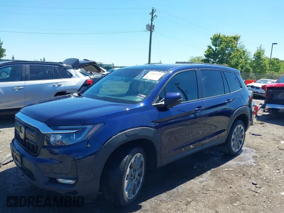 ✅ 2025 Honda Passport EX-L • VIN: 5FNYF8H51SB006412 • Lot: 45062277. Listed on IAAI with 17,994 mi. Free auction sales archive from the USA and detailed vehicle history report at DreamBid. Image 2.