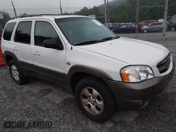 ✅ 2003 Mazda Tribute ES • VIN: 4F2CZ96163KM05215 • Лот: 42869620. Опубліковано раніше на IAAI з пробігом 137 001 миль. Безкоштовний доступ до архіву аукціонних продажів зі США та докладний звіт про історію автомобіля на DreamBid. Зображення 1.