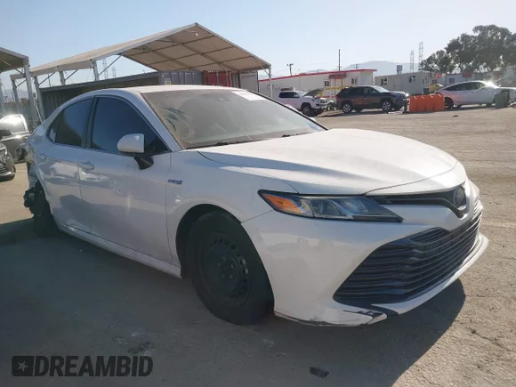 ✅ 2018 Toyota Camry Hybrid LE • VIN: 4T1B31HK5JU001954 • Lot: 44944895. Listed on IAAI with 149,856 mi. Free auction sales archive from the USA and detailed vehicle history report at DreamBid. Image 1.