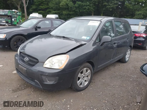 ✅ 2007 Kia Rondo LX • VIN: KNAFG525277050585 • Лот: 43005370. Опубліковано раніше на IAAI з пробігом 93 403 миль. Безкоштовний доступ до архіву аукціонних продажів зі США та докладний звіт про історію автомобіля на DreamBid. Зображення 2.