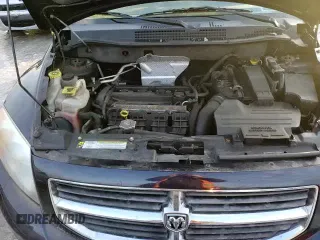 ✅ 2010 Dodge Caliber Mainstreet • VIN: 1B3CB3HAXAD648284 • Лот: 84856604. Опубликован ранее на Copart с пробегом 84 032 миль. Бесплатный доступ к архиву аукционных продаж из США и подробный отчёт об истории автомобиля на DreamBid. Изображение 13.