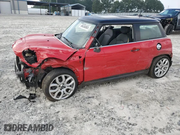 ✅ 2010 MINI Hardtop S • VIN: WMWMF7C55ATZ70438 • Лот: 66036565. Опубликован ранее на Copart с пробегом 40 438 миль. Бесплатный доступ к архиву аукционных продаж из США и подробный отчёт об истории автомобиля на DreamBid. Изображение 1.
