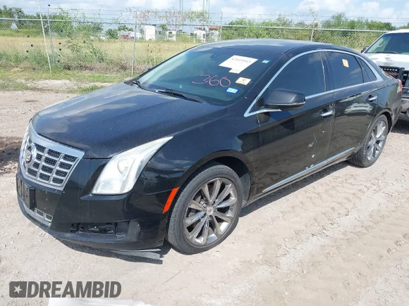 ✅ 2014 Cadillac XTS Livery • VIN: 2G61U5S30E9225953 • Lot: 42411043. Wystawiony na IAAI z przebiegiem 159 129 mil. Bezpłatny archiwum sprzedaży aukcyjnych z USA i szczegółowy raport historii pojazdu na DreamBid. Zdjęcie 2.