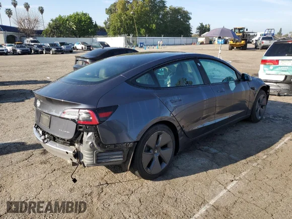 ✅ 2022 Tesla Model 3 Long Range • VIN: 5YJ3E1EBXNF115339 • Лот: 45383813. Опубліковано раніше на Copart з пробігом 15 579 миль. Безкоштовний доступ до архіву аукціонних продажів зі США та докладний звіт про історію автомобіля на DreamBid. Зображення 3.