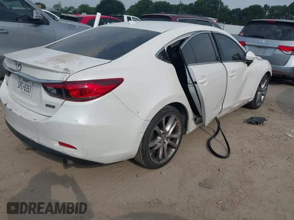 ✅ 2014 Mazda 6 i Grand Touring • VIN: JM1GJ1W50E1112433 • Лот: 42265857. Опубликован ранее на IAAI с пробегом 180 859 миль. Бесплатный доступ к архиву аукционных продаж из США и подробный отчёт об истории автомобиля на DreamBid. Изображение 4.