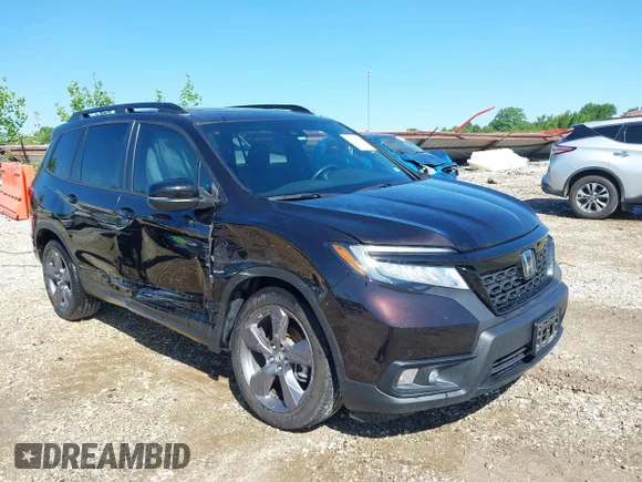 ✅ 2021 Honda Passport Touring • VIN: 5FNYF7H98MB007542 • Lot: 42304368. Listed on IAAI with 18,804 mi. Free auction sales archive from the USA and detailed vehicle history report at DreamBid. Image 1.