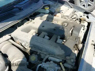 ✅ 2004 Chrysler Concorde • VIN: 2C3AD36M74H594810 • Lot: 43040909. Listed on IAAI with 162,538 mi. Free auction sales archive from the USA and detailed vehicle history report at DreamBid. Image 19.