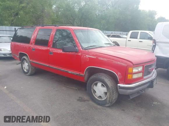 ✅ 1998 GMC Suburban • VIN: 1GKFK16RXWJ708036 • Lot: 43072488. Listed on IAAI with 265,993 mi. Free auction sales archive from the USA and detailed vehicle history report at DreamBid. Image 1.